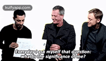 a man is holding a piece of paper that says " everyday i ask myself that question what is the significance of me " .