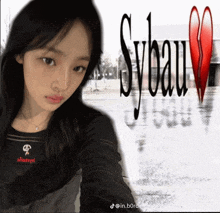 a picture of a girl with sybau written in red
