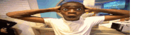 a man with a surprised look on his face is holding his head