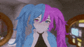 a girl with blue and pink hair is wearing a choker around her neck