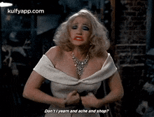 a woman in a white dress is making a funny face and saying do n't i learn and ache and shop