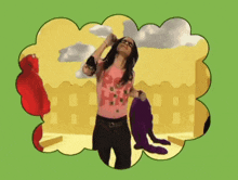 a woman in a pink shirt with the word elmo on it stands in front of elmo
