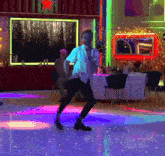 a man in a white shirt is dancing on a dance floor with a red star in the background