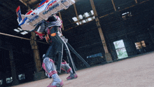 a person in a robot costume is standing in a dark room