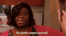 a woman says " you better watch yourself " while looking at a man