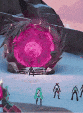 a group of people are standing in front of a giant pink object