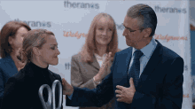 handshake elizabeth holmes amanda seyfried the dropout congrats