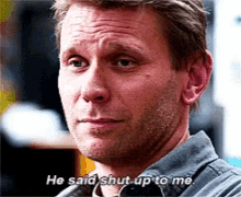 a man with a beard is saying he said shut up to me