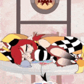 a girl with red hair is laying on a table