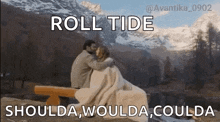a man and a woman are sitting on a bench covered in a blanket .