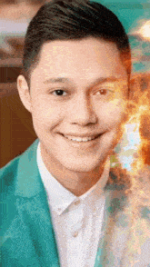 a close up of a man 's face with fire coming out of it