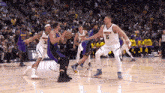 a basketball game is being played between the nuggets and lakers