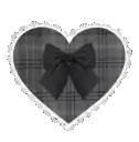 a black and white photo of a heart with a black bow .