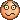 a pixel art smiley face with a sad look on it 's face .