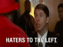 Haters To The Left Hate GIF - Haters To The Left Hate Suit GIFs