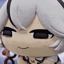 a close up of a cartoon character 's face with a smiley face