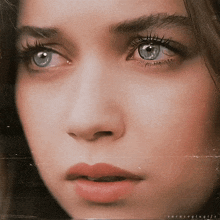 a close up of a woman 's face with the name sara on the bottom right