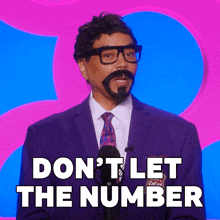 a man in a suit and tie says " don t let the number "