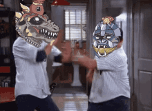 two cartoon characters are fighting in a room and one has a skull on his head