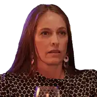 a woman with long brown hair is wearing a black and white striped shirt