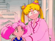 a girl with pink hair is standing next to a woman in a pink jacket