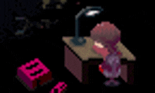 a pixel art of a person sitting at a desk with a lamp and a pink box .
