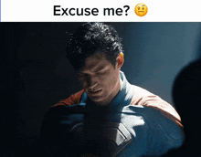 a man in a superhero costume with the words excuse me below him