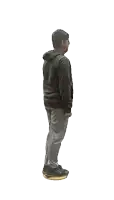 a man in a black hoodie and grey pants is standing on a white surface
