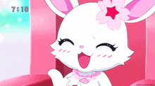 a cartoon rabbit with a flower on her head and the time 7:18 on the bottom
