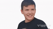 a person wearing a black t-shirt that says vigle.ai on it