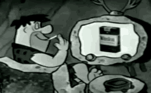 Fred Flintstone Smoking A Cigarette GIF - Fred Flintstone Smoking A Cigarette Cartoon Smoker GIFs