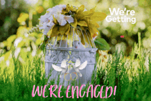 a greeting card that says " we 're getting we 're engaged "