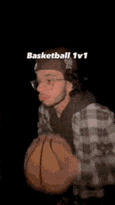 a man wearing a hat and a black hoodie is talking about basketball 1v1 .
