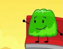 a green cartoon character is sitting on a red couch and smiling .