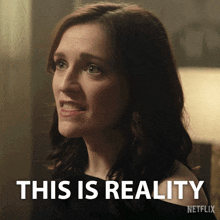 a picture of a woman with the words " this is reality " below her