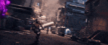 a blurry picture of a city with a purple object in the background