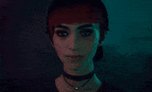 a woman with red hair is wearing a choker and a black shirt