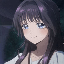 a close up of a girl 's face with the word mimi on her head