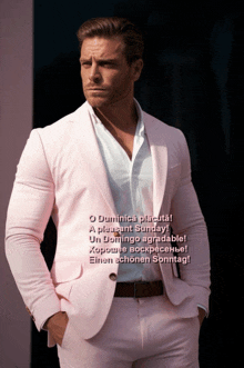 a man in a pink suit is standing with his hands in his pockets and says a pleasant sunday on the bottom