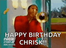 a man in a red shirt is blowing a trumpet and says happy birthday chrisk !!