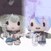 two stuffed dolls are standing next to each other and one of them says ruinene bakery on it .