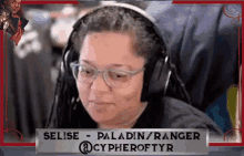 a woman wearing headphones has the name selise on the bottom