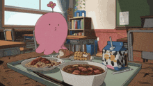 a pink octopus with a flower on its head sits next to a tray of food and a box of milk