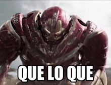 a robot with the words que lo que written on it