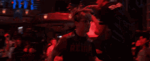 a man wearing a shirt that says snb on it