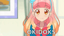 a cartoon girl with pink hair and the word okidoks on the bottom