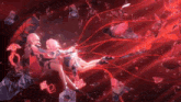 a couple of anime girls are sitting on a rock surrounded by red ribbons