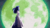 a girl in a white dress stands in front of a green moon