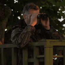 binoculars robert e fuller watching observing spying