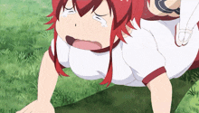 a girl with red hair is crying while doing push ups in the grass